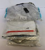 Eight items of as new Monari clothing.