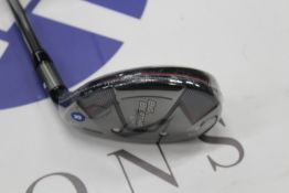 An as new Callaway Big Bertha B21 hybrid with a RCH 65 golf shaft (Right-handed).