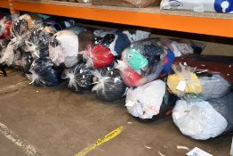 Twelve bags of pre-owned clothing and related items.