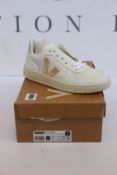 A pair of as new Veja V-10 trainers (UK 4).