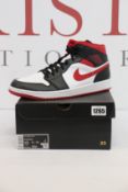 A pair of as new Nike Air Jordan 1 Mid (UK 12).