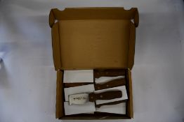 Twelve as new Don Carlos Original Pallet Knives (4530-04,00).