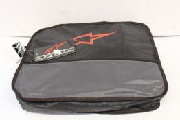 An Alpinestars KMX-3 V2 kart suit (Size: Eur 58).