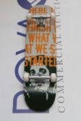 An as new Banksy x Clown Manifesto Orange Skateboard.