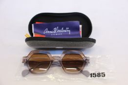 A pair of as new Anne & Valentin sunglasses.