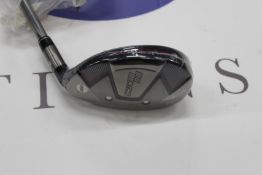 An as new Callaway Big Bertha B21 hybrid with a RCH 65 golf shaft (Right-handed).