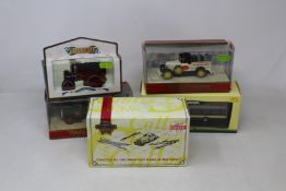 An assortment of thirty model cars with the majority in 1:43 scale to include Great British Buses,