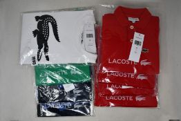 Eight children's assorted as new Lacoste T-shirts/polo shirts.