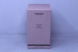 Four boxed as new Stoneglow London perfume mist diffusers.