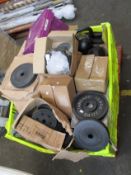 A pallet of assorted weights, kettle bells and related items.