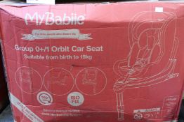 A MyBabiie Group 0+/1 Orbit car seat (Ref: 701188).