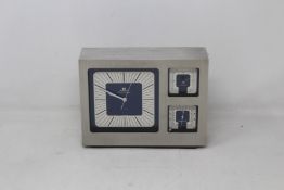 A pre-owned Jaeger Le Coultre brushed steel weather station (Item has some light surface marks, a