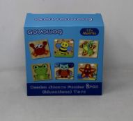 A box of Aovowog wooden jigsaws puzzles (Eighteen per box).