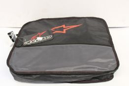 An Alpinestars KMX-3 V2 kart suit (Size: Eur 50).