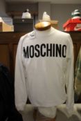 An as new Moschino Couture sweatshirt in white (TG 46).