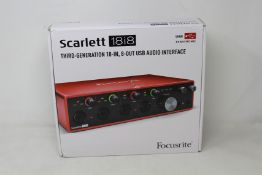 A Focusrite Scarlett 18i8 - Third Generation 18-In, 8-Out USB Audio Interface.