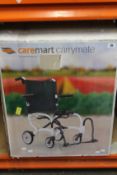 A Caremart Carry Mate travel wheelchair, 'wheelchair in a bag'.