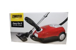 A new Zanussi Easy Go ll Red 3L, 700W, 7.5M radius retractable cord vacuum cleaner.