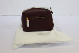 An as new Smaak Amsterdam Blake bag in burgundy.