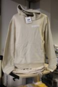 An as new Jacquemus Le Sweatshirt hoodie in beige (S).