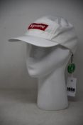 An as new Supreme zip mesh camp cap in white.