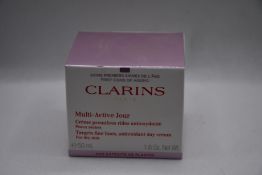 Six Clarins multi - active jour targets fine lines, antioxidant day cream (6 x 50ml).
