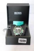 An as new Hugo Boss Deep Ocean Hole In One watch.