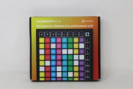 A boxed as new Novation Launchpad X (Grid Controller for Ableton Live).