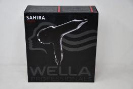 A boxed as new Wella Sahira Colour Hairdryer.
