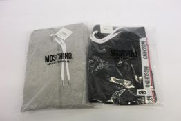An as new Moschino zip hoodie and shorts (Both XL).
