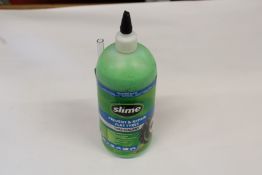 Six as new bottles of Slime prevent and repair flat tyres sealant (946ml bottles).