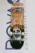An as new Banksy x Clown Manifesto Orange Skateboard.
