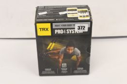 An as new TRX Pro4 suspension trainer.
