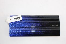 An as new Jimmy Choo Sweetie acrylic clutch in glitter blue (No tags but item is as new - RRP £