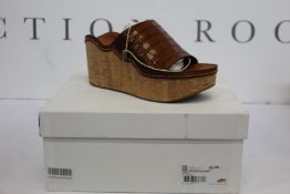 A pair of women's as new Chloe Lauren wedge mules (EU 38.5).