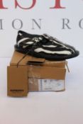 A pair of as new Burberry Hannie T-bar shoes in black/white (UK 7).