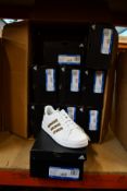 Nine pairs of children's/youths Adidas Grand Court trainers (1 x UK 5, 8 x UK 5.5).