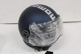 A boxed as new MOMO Design Evo motorbike helmet in blue matte/silver (ML).