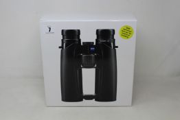 A boxed as new pair of Zeiss Victory SF 8x42 binoculars.