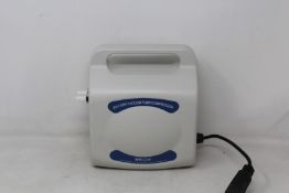 A Welch 2511 dry vacuum pump/compressor (Model: 2511C-02).