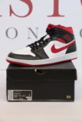 A pair of as new Nike Air Jordan 1 Mid (UK 9.5).