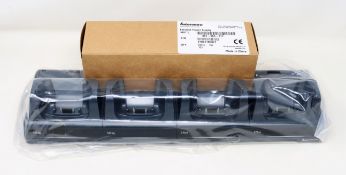 A boxed as new Intermec CN70 Quad Bay Dock Charger (P/N: DX4A2111100) (Box opened).