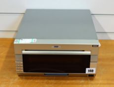 COLLECTION ONLY: A pre-owned DNP DS40 photo printer.