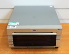 COLLECTION ONLY: A pre-owned DNP DS40 photo printer.