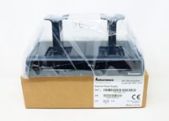 A boxed as Intermec DX2A2AA20 4 Bay Battery Charger For CN70 Barcode Scanners.
