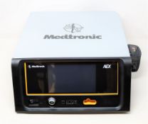 A pre-owned Medtronic AEX Generator 40-405-1R Plasmablade Aquamantys (Powers on, not tested further.