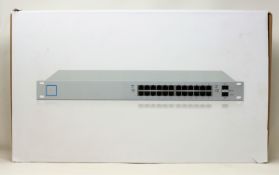 A boxed as new Ubiquiti UniFi 24-Port 250W Managed PoE Switch (M/N: US-24-250W) (Some damage to