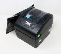 A pre-owned TSC DA200 Desktop Direct Thermal Barcode Printer (Power supply included) (Tested,