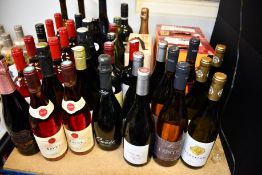 A shelf containing assorted wines to include Tavel, Sacramento and I produttori (Approximately 40