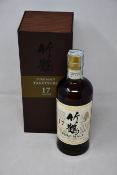 A bottle of Nikka Whisky Pure Malt Taketsuru 17 year old whisky (700ml) (Over 18s only).